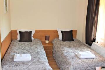 Фото номера Дом с 7 комнатами Дома для отпуска Guest House Brezata - Betula г. Главатарци 8